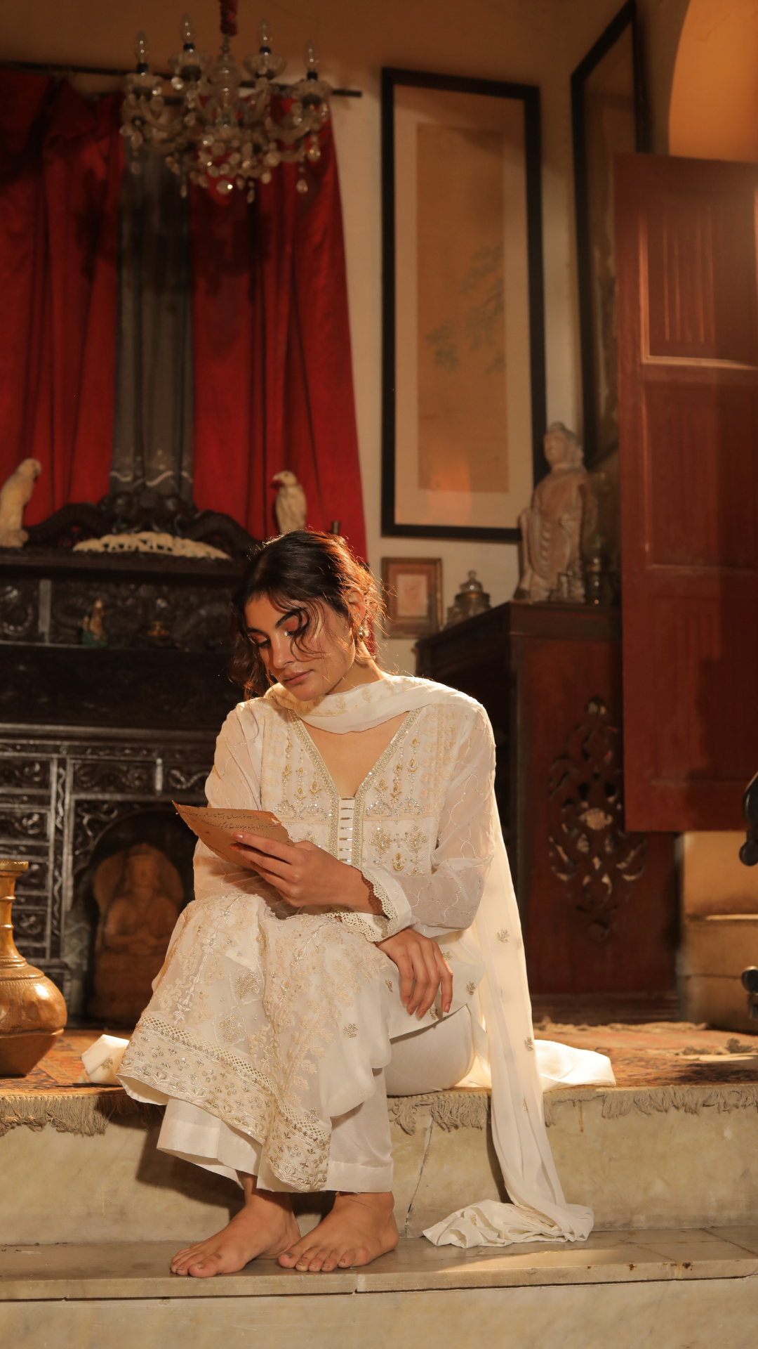 A fancy Pakistani shalwar kameez with vibrant colors from top Pakistani clothes brands.