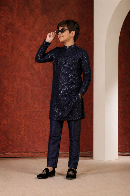 Kid in a navy kurta