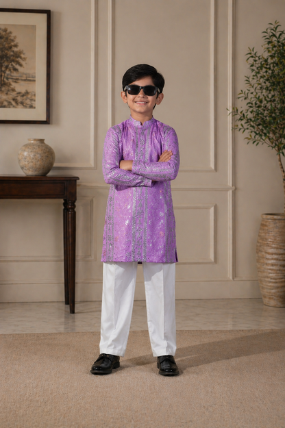 Kid wearing a purple kurta with white pants