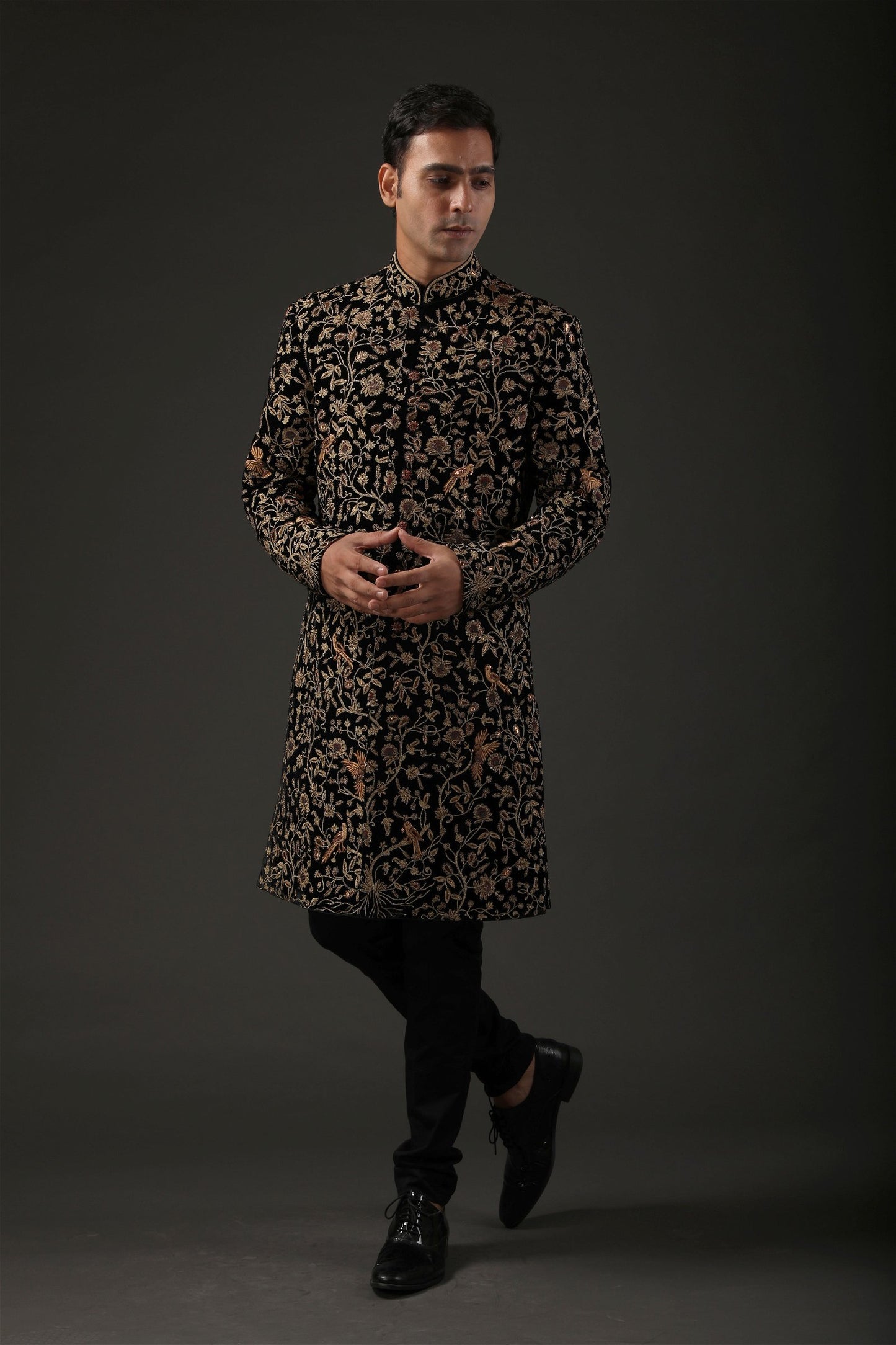 Immerse yourself in the sophistication of groom sherwanis, from the distinguished black sherwani with a red kulla to the classic groom black sherwani.