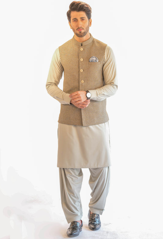 Elevate your style with trendy men's waistcoat designs – from stylish blue shalwar kameez to off-white and brown ensembles